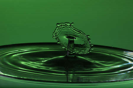 Drops of water on a water surface that result in water sculptures.の写真素材