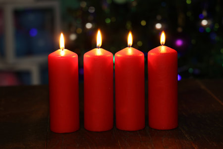 Fourth Advent, four candles burning. Advent background.の写真素材