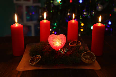 Fourth advent, four candles burning. Advent background.の写真素材