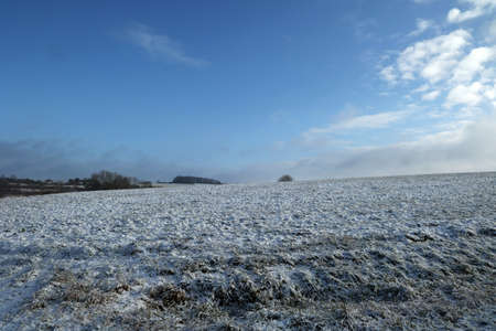 Winter landscape, Arable land covered with snow.の写真素材