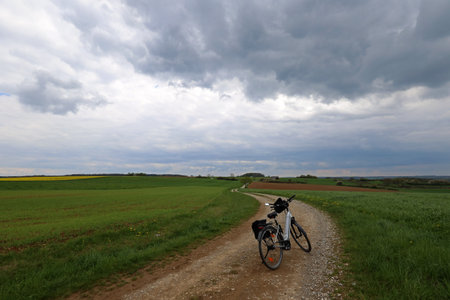 Spring landscape before a thunderstorm. A walk on the bike.の写真素材