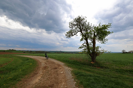 Spring landscape before a thunderstorm. A walk on the bike.の写真素材
