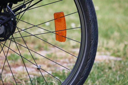 Fragment of a bicycle wheel. Tires, rims and spokes.の写真素材