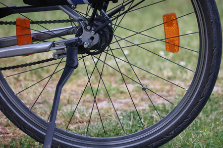 Fragment of a bicycle wheel. Tires, rims and spokes.の写真素材