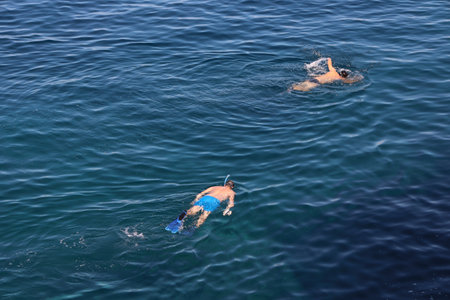 Men snorkeling in the sea.の写真素材