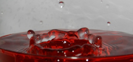 a drop in a red glass