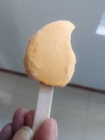 Fresh Mango Ice Cream Scoop in Cone