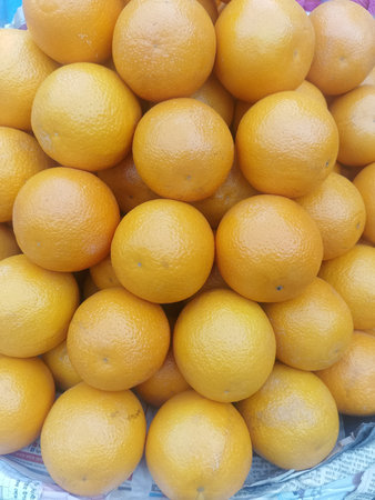 Fresh Organic Orange Fruit on Natural Background