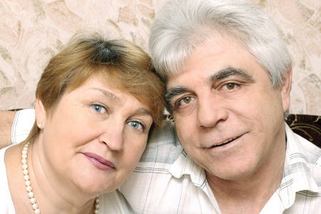 Smiling elderly couple enjoying themselves togetherの写真素材