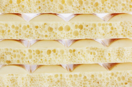 white porous chocolate lies by the pileの写真素材