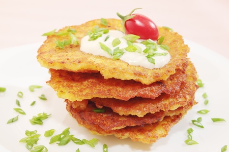fried pancakes from the potatoes on the plateの写真素材