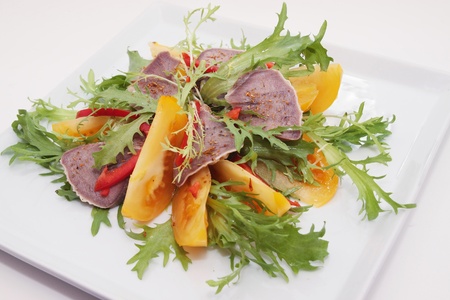 Beef Tongue with the lettuce, paprika and tomato の写真素材