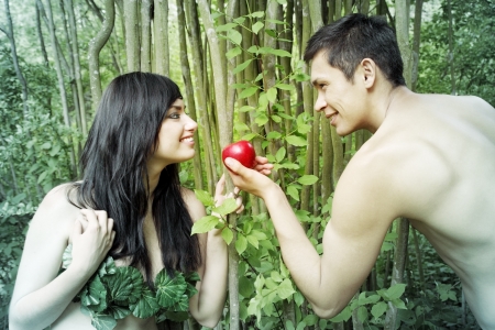 Adam and Eve are going to eat an appleの写真素材