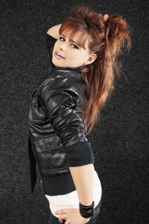 Brunette dressed in the style of 80 yearsの写真素材