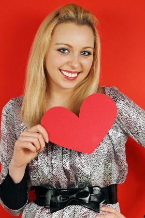woman holding a heart on Valentine's Dayの写真素材