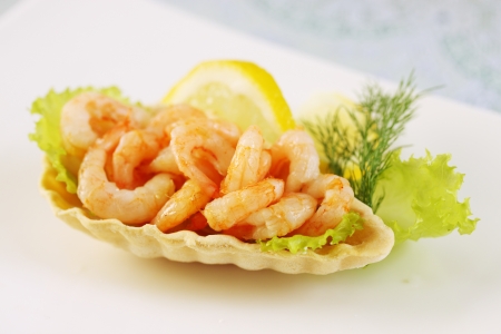 Crispy waffle basket with shrimp and lemonの写真素材