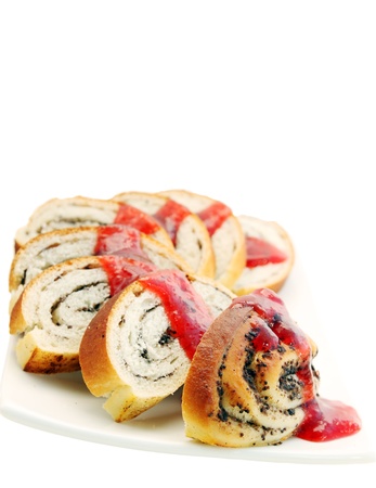 âcake with poppy filling on a white backgroundの写真素材