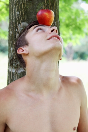 man with an apple on his headの写真素材