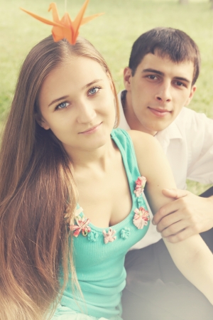 Portrait of a young romantic couple on natureの写真素材
