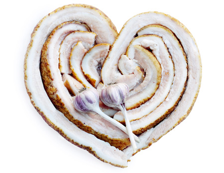 Ukrainian lard with garlic in the form of heartの写真素材