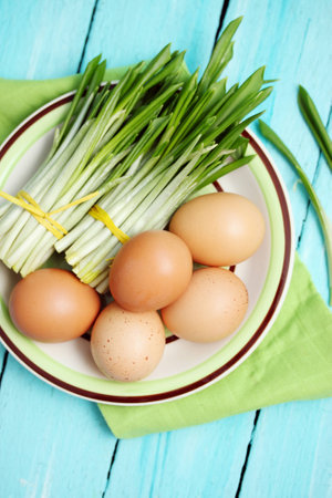 Bunches of ramson and boiled eggs for spring saladの写真素材