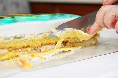 Chef gives shape to the cake, cutting edge
