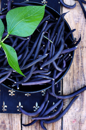 Blue asparagus beans in a large bowlの写真素材