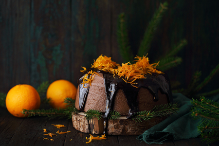 cake with chocolate icing with candied orange peelの写真素材