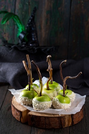 Apples in white chocolate glazeの写真素材