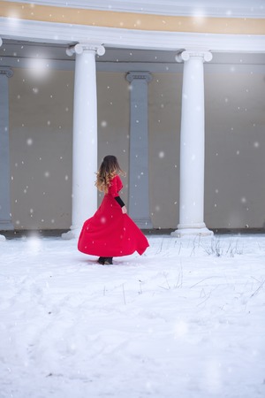 Woman dancing in winterの写真素材