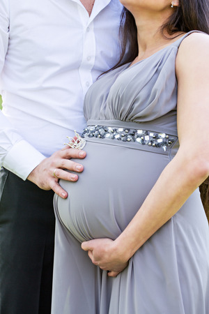 Pregnant couple, close-upの写真素材