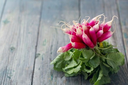 radish on a wooden tableの写真素材