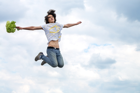 jumping young guyの写真素材