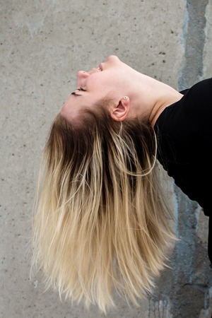 the girl tilted her headの写真素材