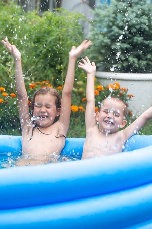 The children are splashingの写真素材