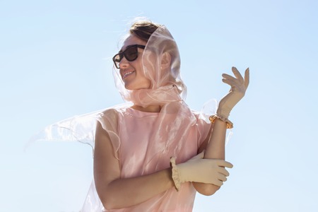 Happy woman with glovesの写真素材