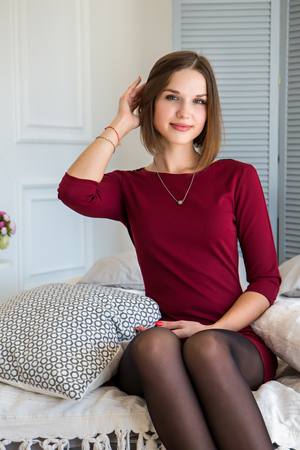 beautiful woman in the bedroomの写真素材