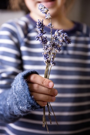 happy girl holding a bouquetの写真素材