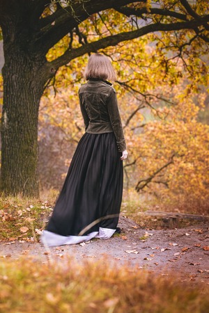 The girl stands on a cliffの写真素材