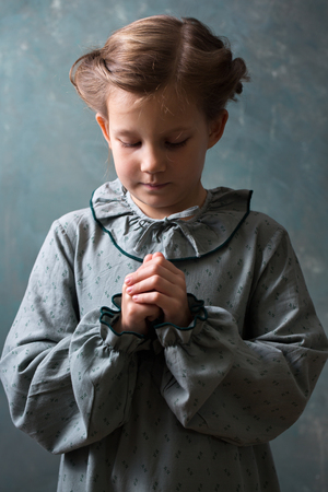 Little girl prays to godの写真素材