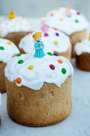 Easter cakes with angel figures on the Ukrainian embroidery towel