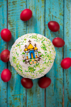 Easter cake with a church on a blue background