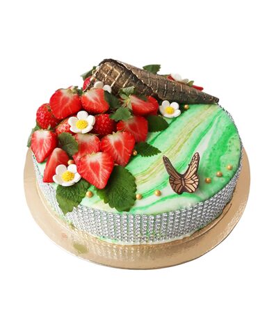 Glazed cake decorated with waffle and strawberries on a white backgroundの写真素材