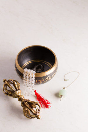 Pendulum, singing bowls and other healing tools for healing in Reiki stream on a white background