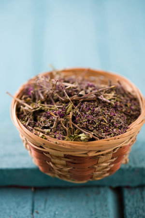 Dry herb Oregano for medicinal tea in the basket