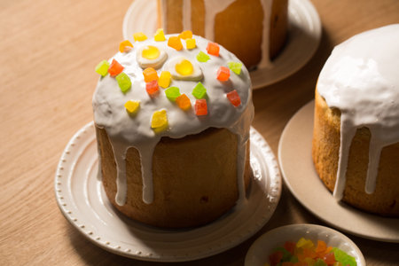 Easter cakes decorated with candied fruits and jelly eggs, close-up