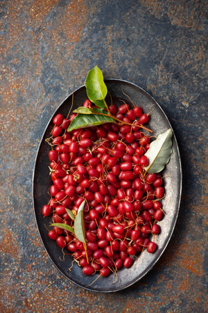 Ripe delicious sweet Gumi berries in a metal antique trey