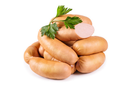 Delicious sausages with parsley isolated on white backgroundの写真素材