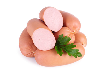Beef sausages nested in a heap and isolated on a white backgroundの写真素材