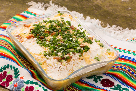Banosh, or tokan Hutsul cuisine. Corn porridge with cream, sheep cheese, cracklings and green onionsの写真素材